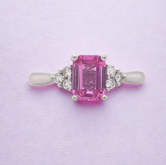 Octagon pink sapphire and diamond shoulder ring in 18 carat white gold